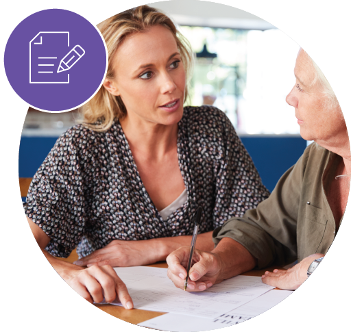 couple discussing papers on table